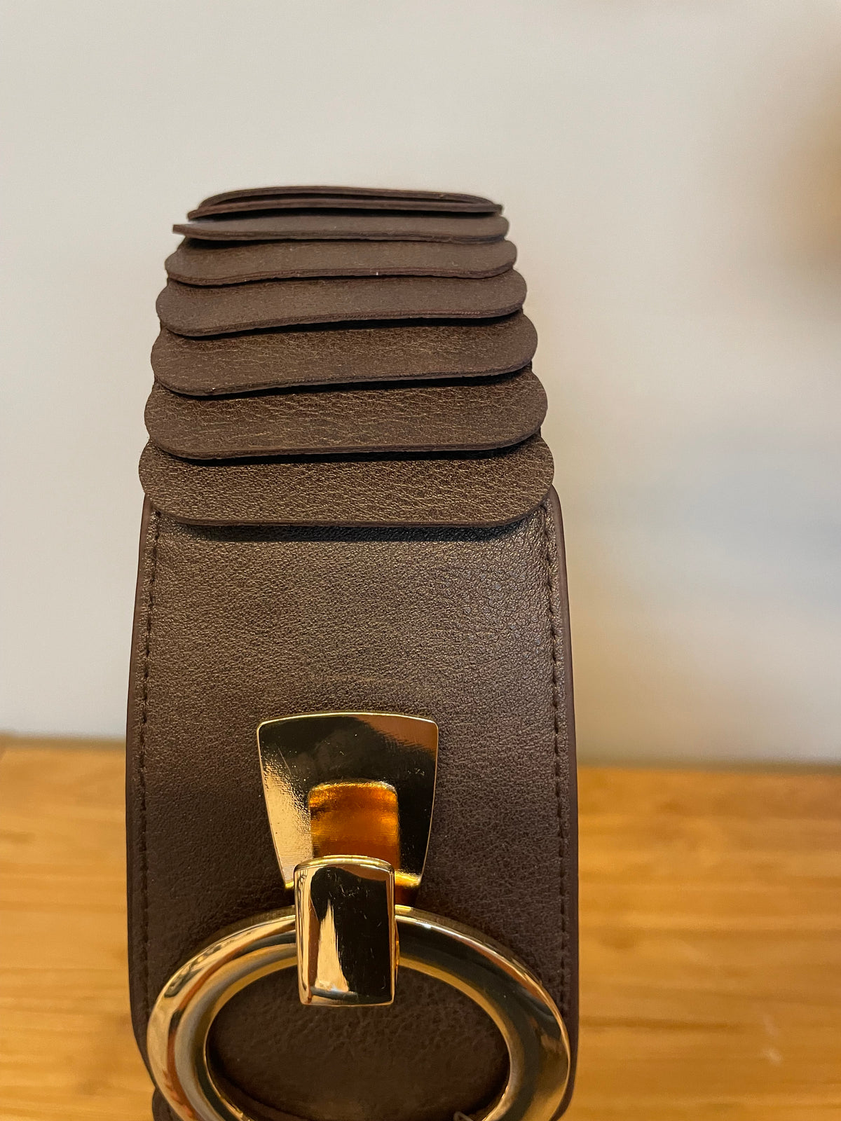 Brede riem Sua bruin