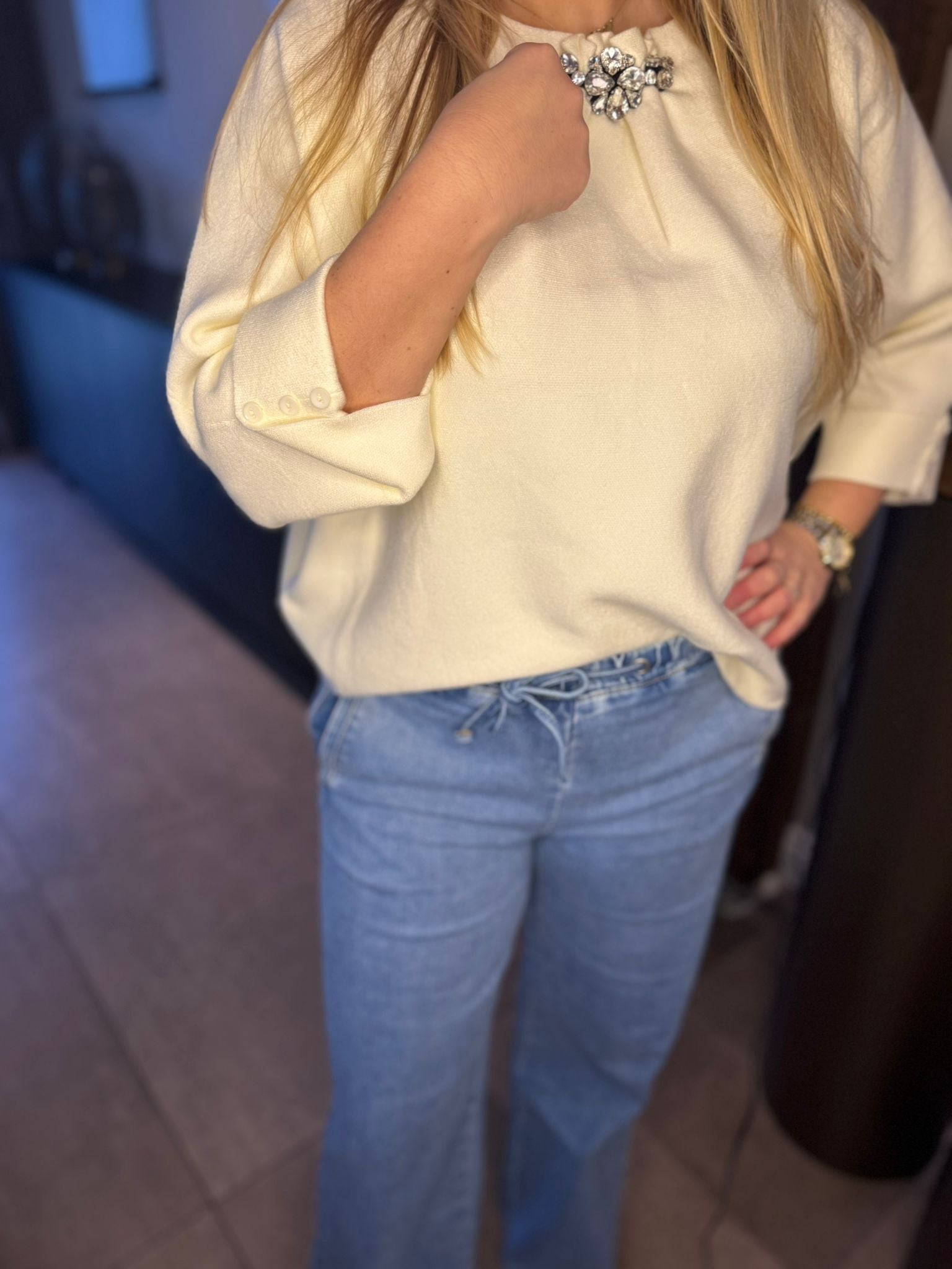 Broche hals trui wolwit