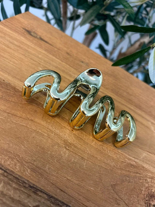Golden swirl klem