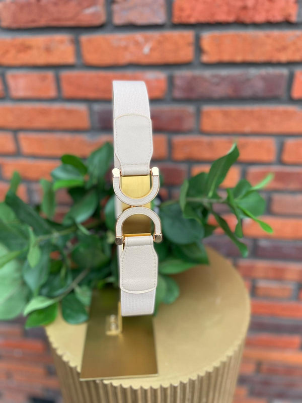 Elastische beige riem met dubbele D