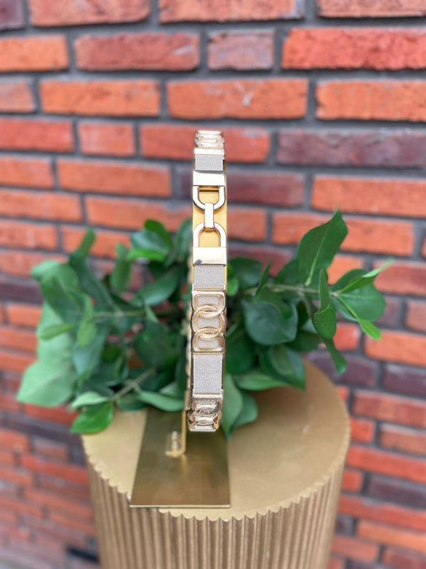 Elastische riem met glitter en gouden details