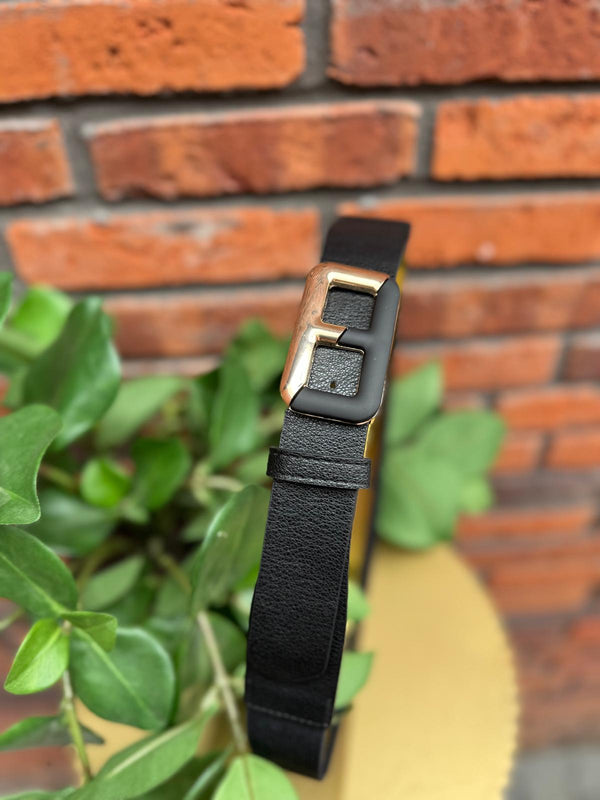 The bold buckle zwart