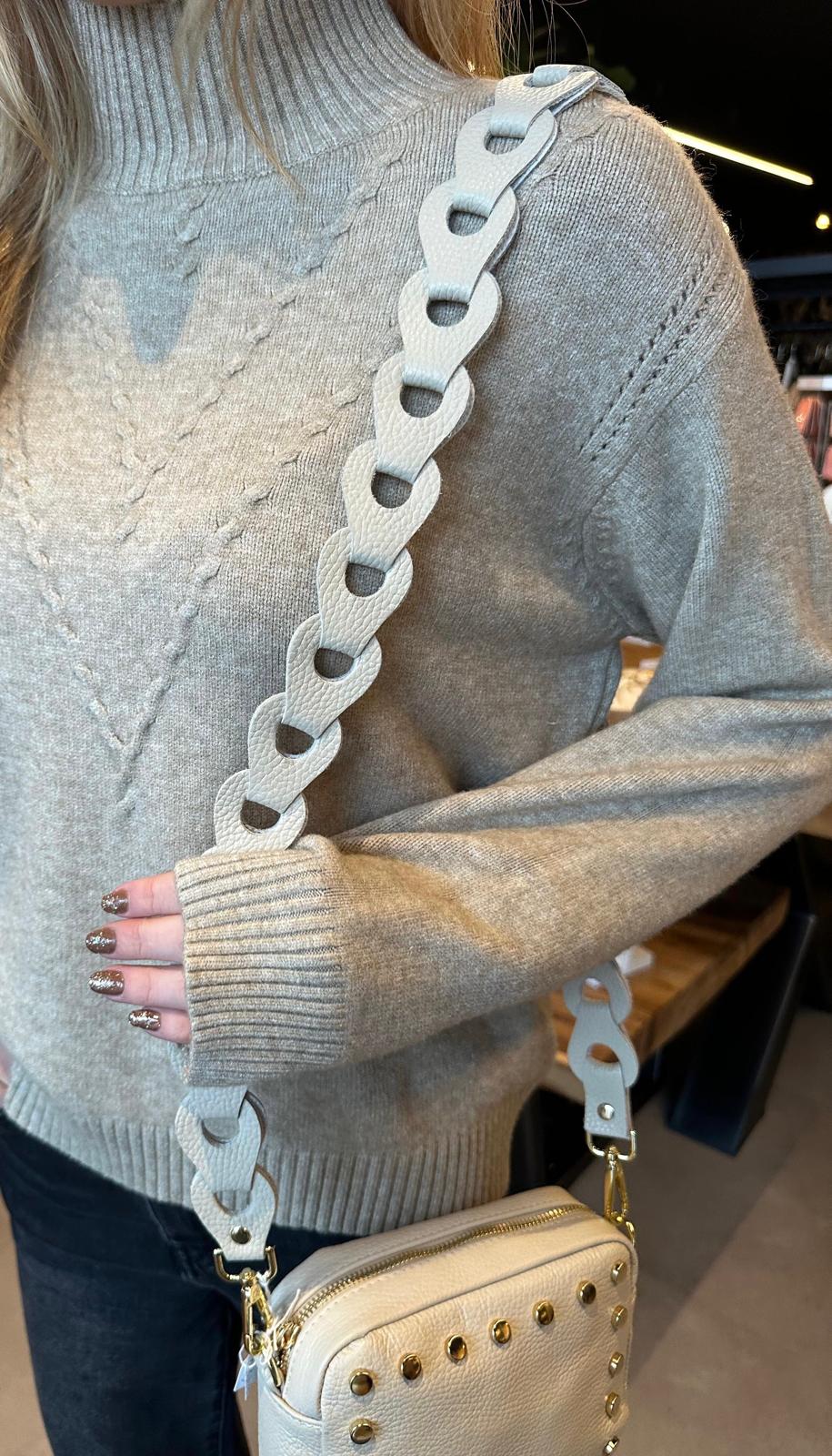 Tassen strap yinthe